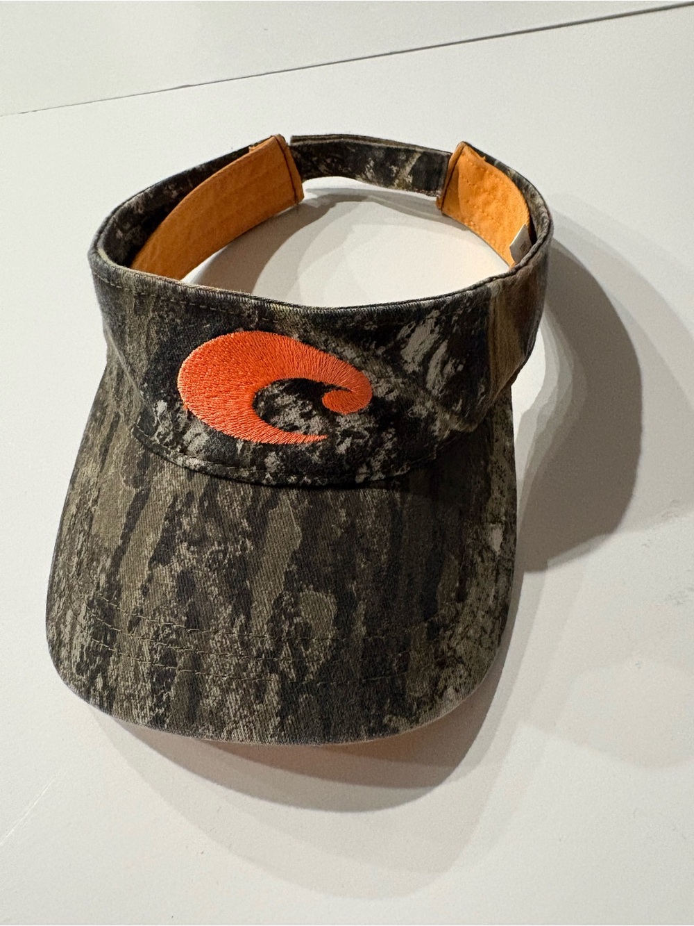 Men’s  Costa Del Mar Camo Visor with Orange Logo Accent, adjustable